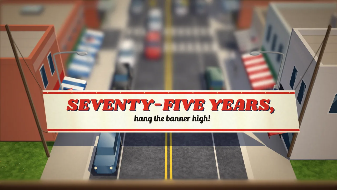 A model Main Street seen from above, under a banner reading SEVENTY-FIVE YEARS, HANG THE BANNER HIGH!